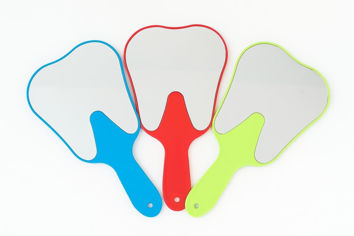 ESPEJO CON MANGO EN FORMA DE MUELA